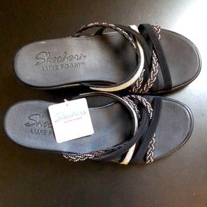Skechers brand new black and silver size9